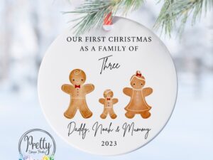 Personalised Bauble with x3 gingerbread characters. Quote saying *Our first Christmas As a Family of 3*.