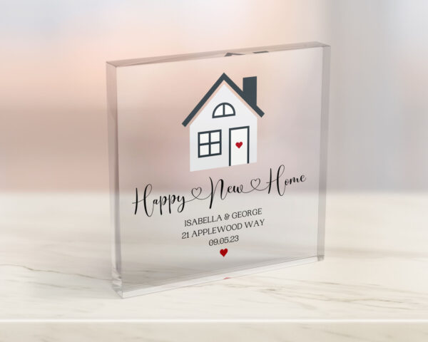 Personalised Acrylic Block House warming gift. Design with small house on and quote saying *Happy New Home* with homeowners name, address and date they moved.
